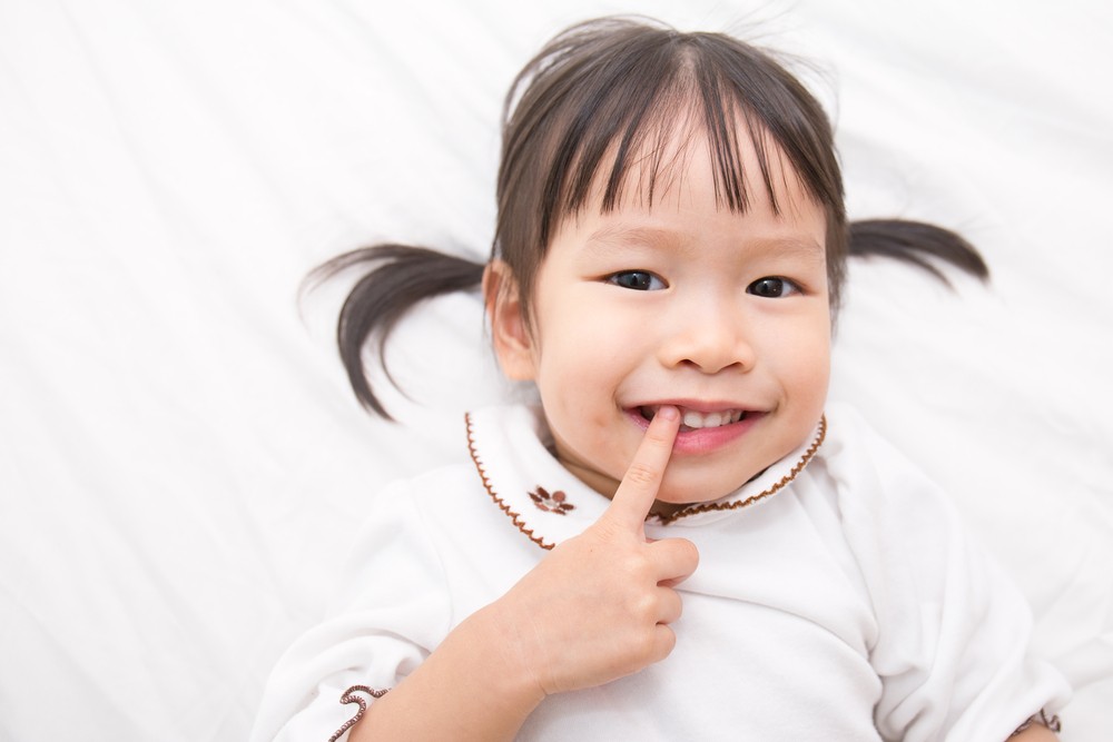 有很多原因導致孩子睡覺時磨牙,包括心理和精神影響