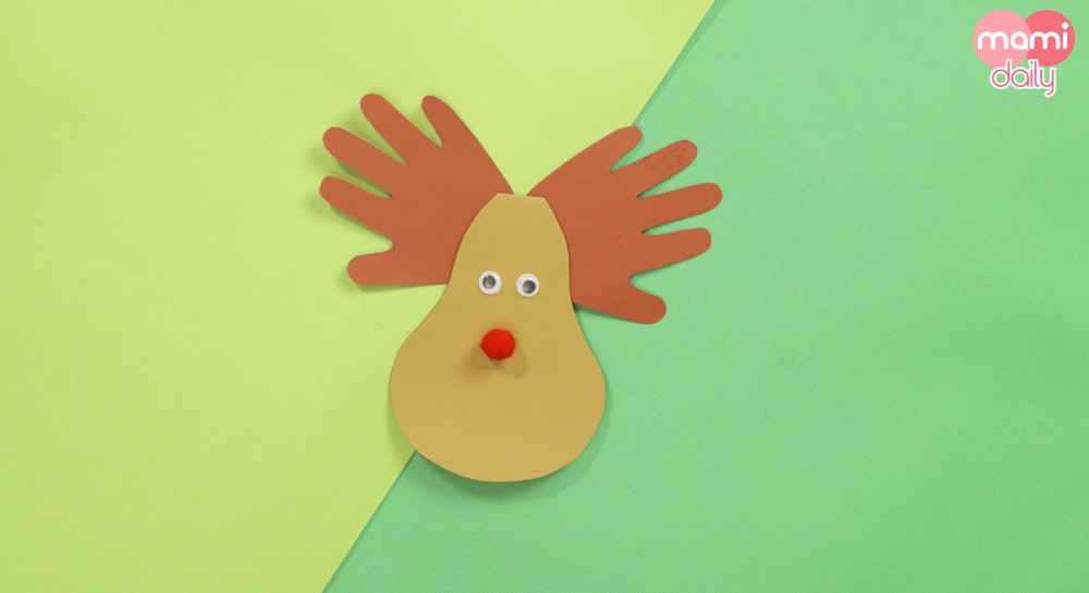 在鼻子上方貼上眼睛