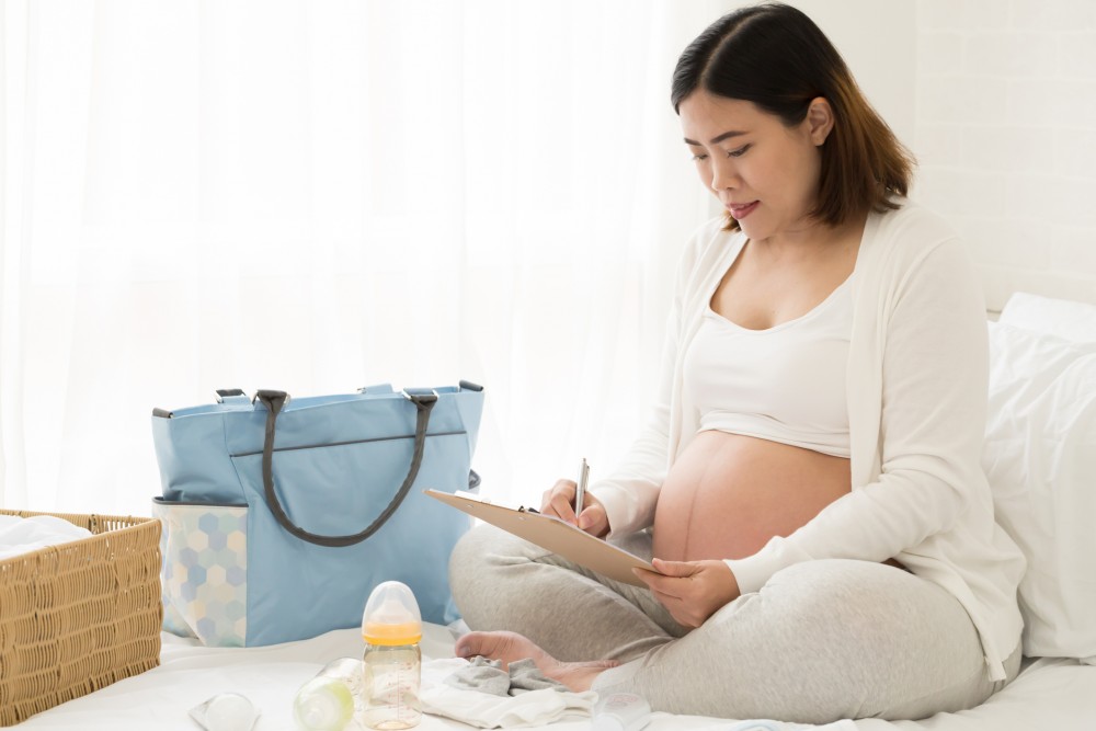 pregnant woman packing