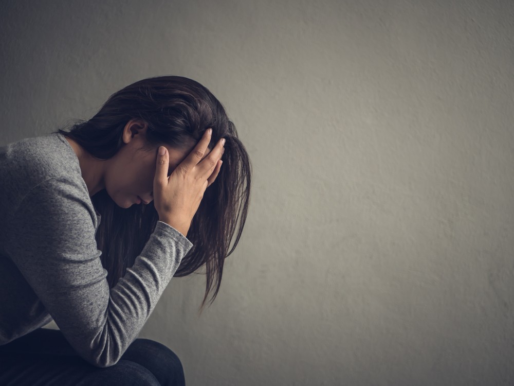 depressed asian woman.