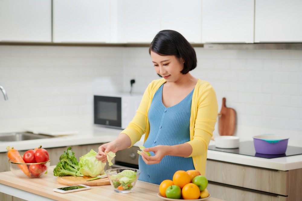 pregnant mother cooking