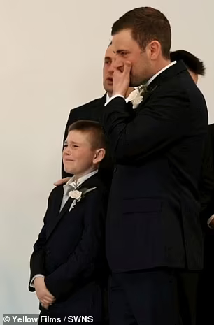 9歲繼子Henry大為感動。