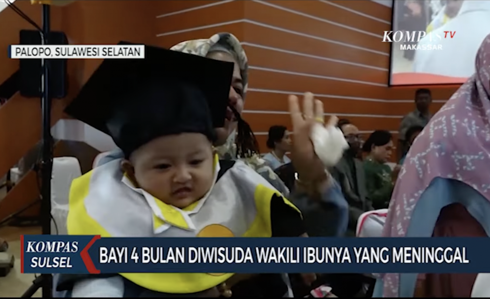 畫面中可見，女兒毫不怯場，安靜地窩在外婆懷中。